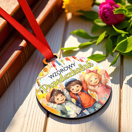 Drobny medal dla uczniów i dzieci na pasowanie
